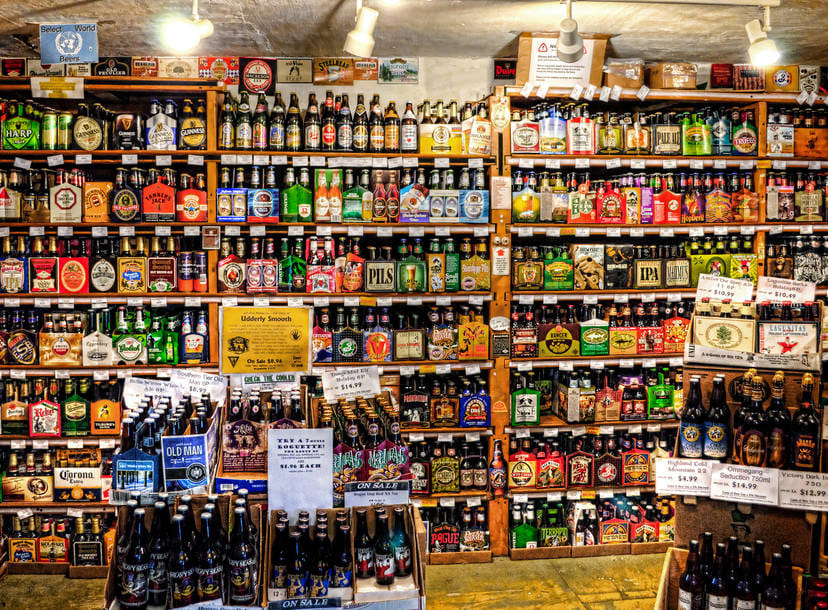 Another view of a retail beer display with dozens of different brands competing for consumer attention
